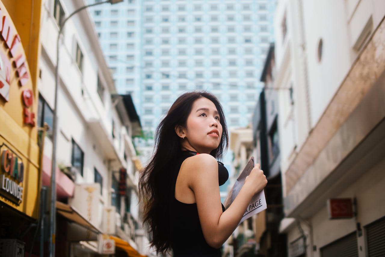 social-feed-img-05 young-woman-exploring-urban-cityscape-in-daylight-33479355